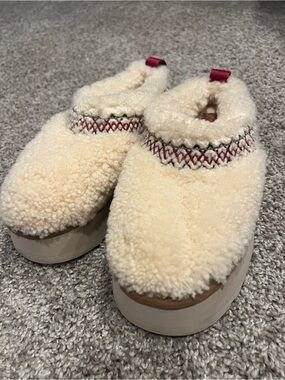 UGG Cream Shearling Platform Clogs with Red Accent